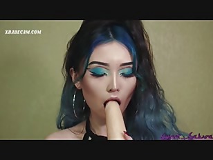 Exptic Asian babe with tattoo fucks her pussy with dildo