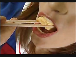 Japanese girl eats and drinks cummy food