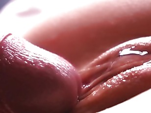 SLOW MOTION. Extremely close up. Sperm dripping down the pussy