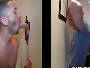 Eager straight guy gets his cock blown through a glory hole
