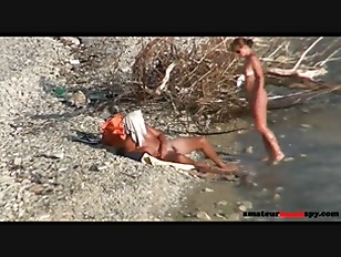 Nudist horny wife riding cock on public beach for everyone to see
